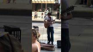 Bro in the yellow shirt didn’t approve and I tried hard not to giggle #singing #busking #shorts