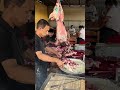 Lamb skewers roasted in a traditional nang pit, full of rich charred meat aroma