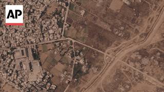 Israel is building a miles-long earthen barrier inside Gaza