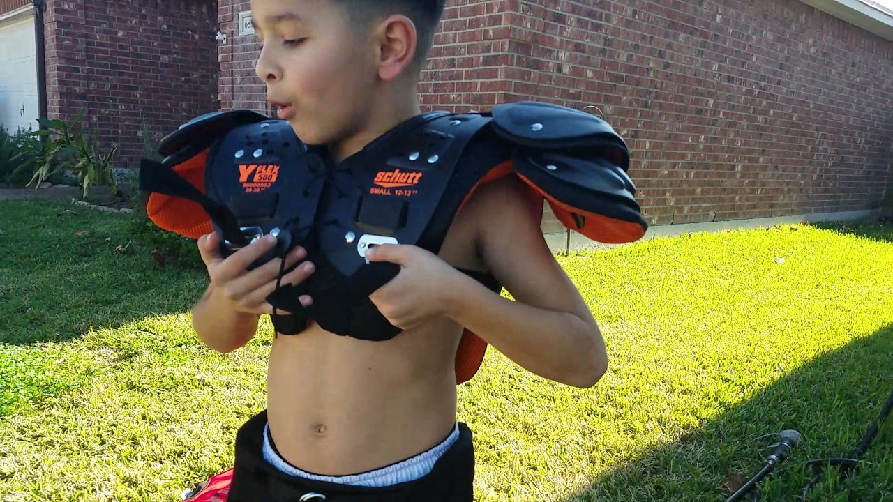 Matt trying on his football gear YouTube
