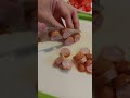 cutting sausages