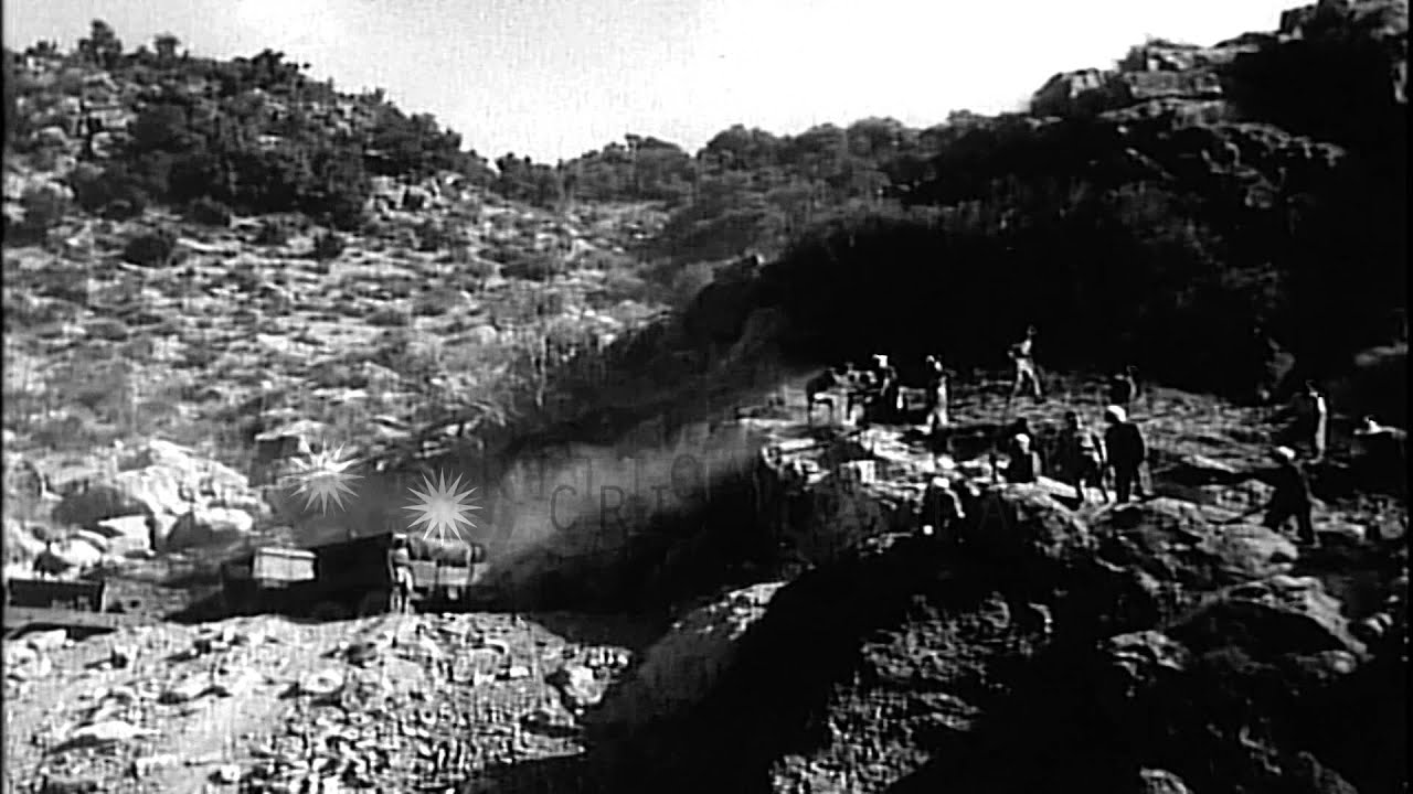 French military engineers survey and use explosives to carve out roads and build ...HD Stock Footage