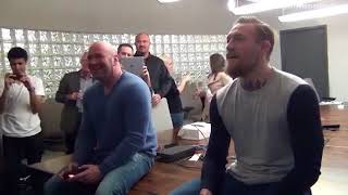 Conor McGregor dons Celtic shirt during training