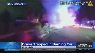 Bodycam footage shows officers pulling driver trapped inside burning car in Alhambra