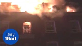Firefighters tackle top-floor blaze at block of flats in London