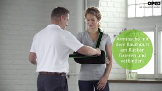 SUPROshoulder Soft: Fixiergurt Option 2 an der Armtasche über links am Rücken | Schulterkonzept screenshot 3