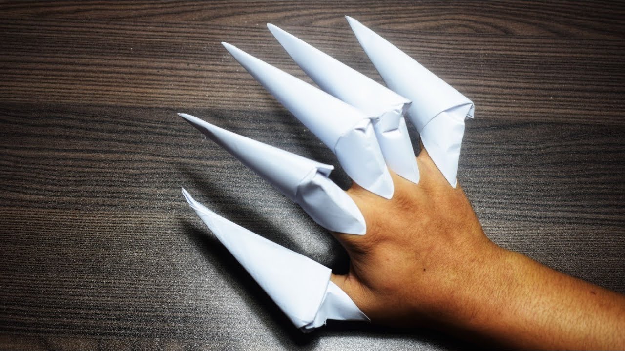 Коготь из бумаги видео. Оригами когти. Когти из бумаги. Когти из бумаги оригами. Кошачьи когти из бумаги.