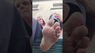 I show you my male mature dirty garden soles while smoking 😎.