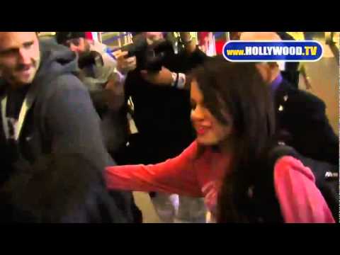 Selena Gomez Arrives At LAX & swarmed by stalker paparazzi