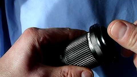 www.northernoptics.co.uk shows how to attach a T-ring to a Celestron Ultima spotting scope