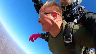 Lee skydiving with dad