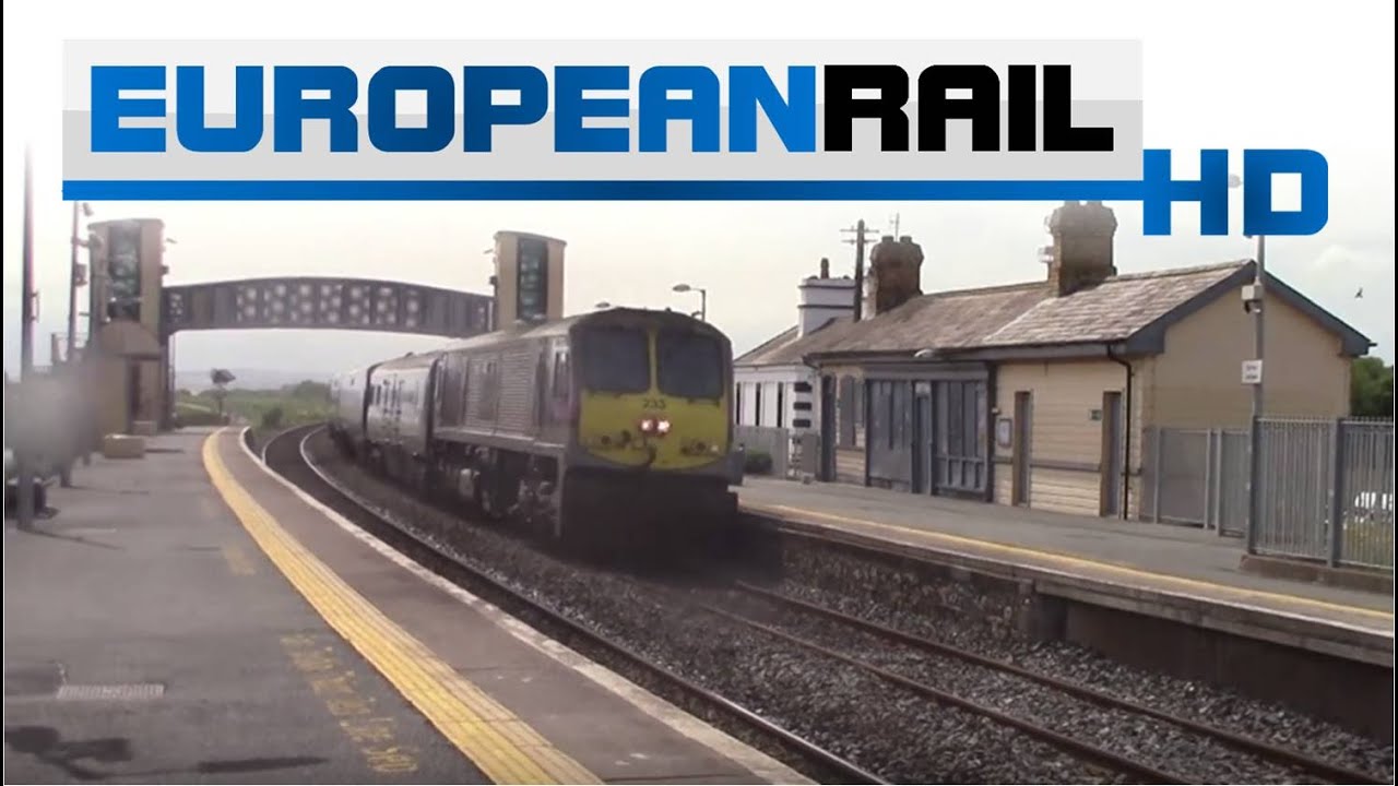 Irish Rail 201 loco 233 + Mark 3 9604 + De Dietrich set 9001 passes & 29001 arrives at Laytownn