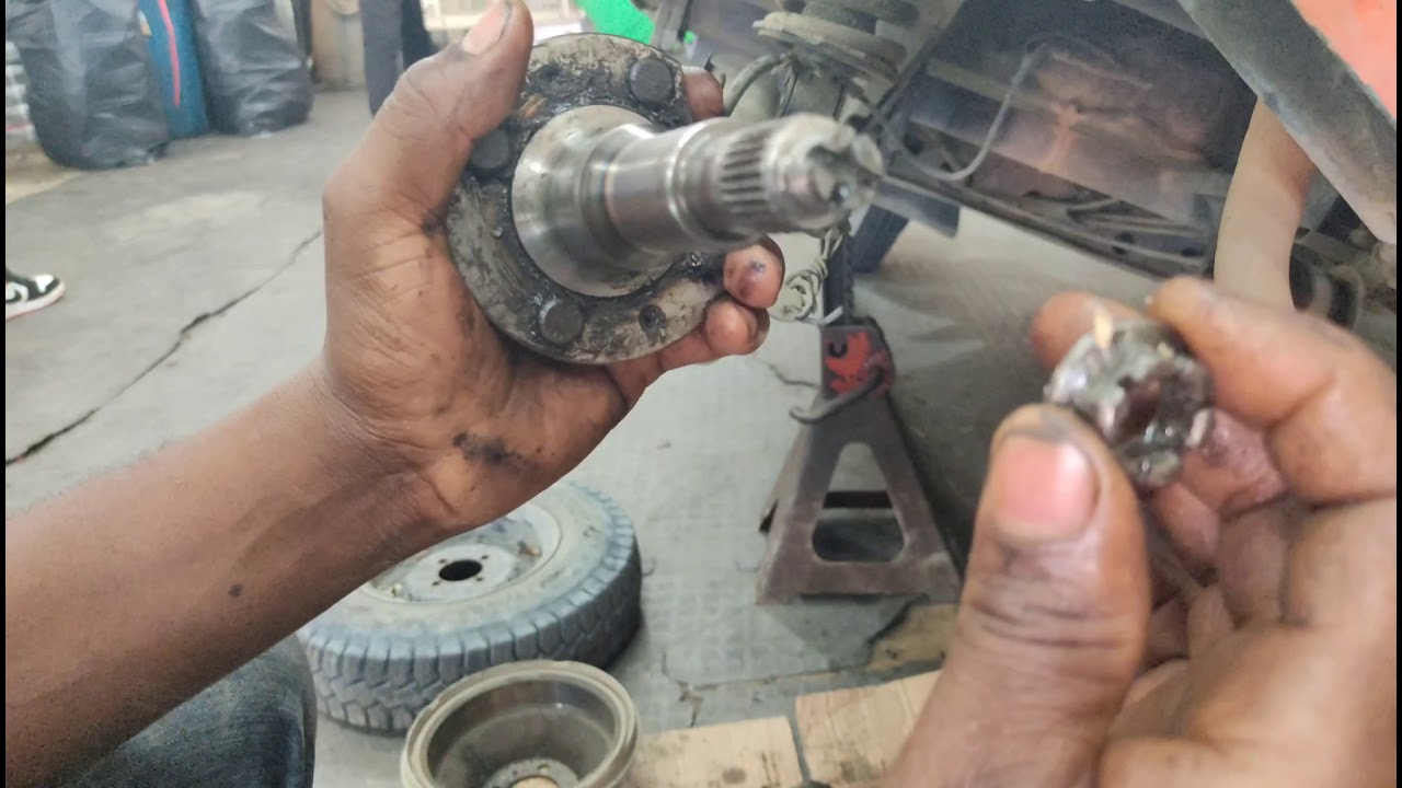 COMO DESMONTAR O BAJAR EL RODAMIENTO TRASERO DE UNA MOTOCARRO BAJAJ