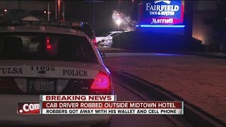 Cab driver robbed outside midtown hotel