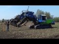 Inter-Drain 1824T Chain Trencher | laying field drainage | Combi Drain B.V.