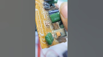Mylar capacitors with codes on the body, one, zero, four #value #mylar #capacitor #education