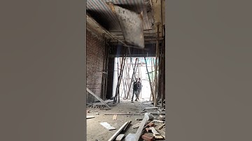 This is a team of workers dismantling the ceiling formwork#construction