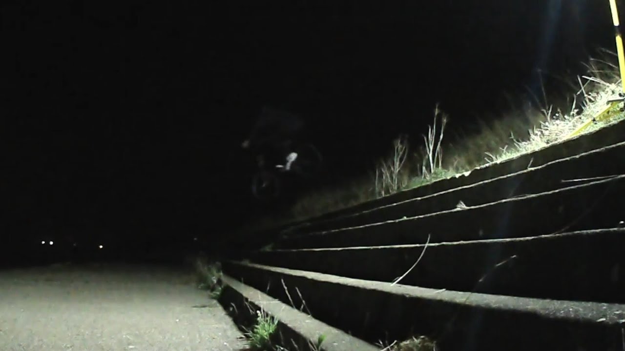 Playing the Out of Touch intro on piano (7th chords non inverted) & riding BMX street.