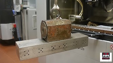 AXA Flexlifting 01M5 counterbalanced crane at work cnc machine video