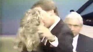Pat Sajak kisses Vanna White