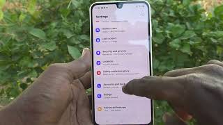 How to enable auto download over wifi for software update in Samsung Galaxy A16 5G screenshot 4