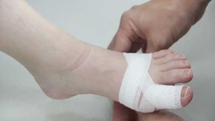 How To Cut An Adhesive Bandage To Fit On A Toe 