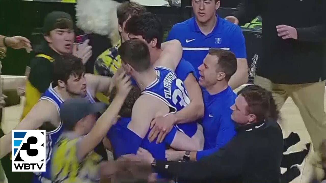 Duke Player Hurt After Fans Storm Basketball Court - YouTube