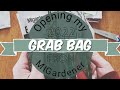 Opening my 2022 grab bag from migardener  what goodies did i get