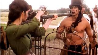 She Pointed a Rifle Through the Gate, Because No Man Was Coming to Save Them