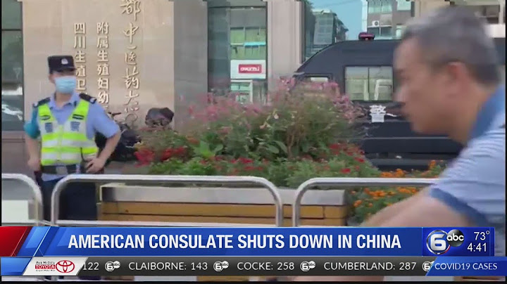 Police corral crowds as movers leave US Consulate in China