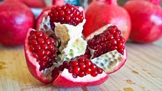 First make an incision in the top part of pomegranate and then pry
open pop it like a lid. comes right off. start by cutting the...