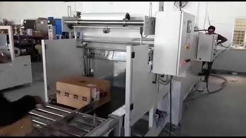 Shrink pack machine for shipper carton