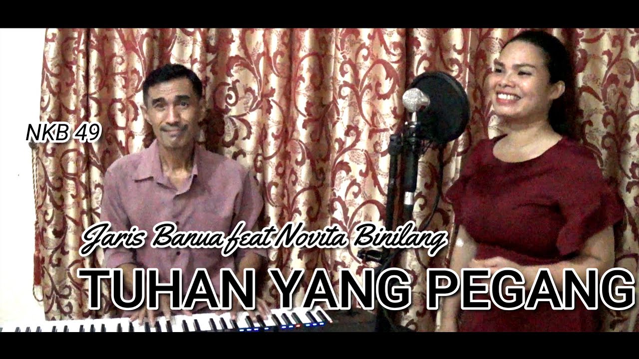 NKB 49. TUHAN YANG PEGANG  - JARIS BANUA Feat NOVITA BINILANG