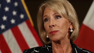 DeVos defends Trump's idea to arm school staff