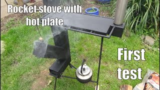 Testing a newly built rocket stove with a hot plate.