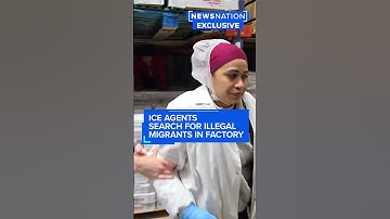 ICE agents search for illegal migrants in factory