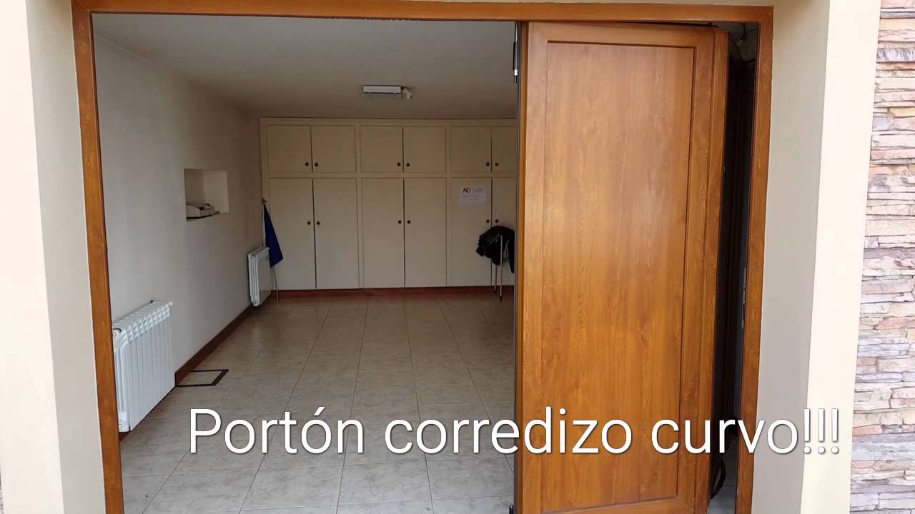 Portón corredizo curvo a control remoto - Metalúrgica Stork - YouTube