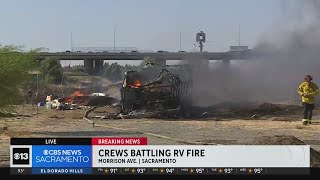 RV fire spreads to vegetation near I-80 in North Sacramento