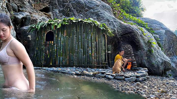 Build a sturdy bamboo shelter next to a big river - Bushcraft survival and catching fish