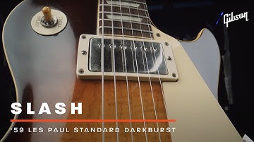 Slash shows Mark Agnesi his super-clean Darkburst 1959 Gibson Les Paul