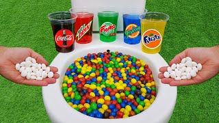 M\&M Candy VS Football, Coca Cola Zero, Fanta, Mtn Dew, Fruko, Pepsi and Mentos in the toilet