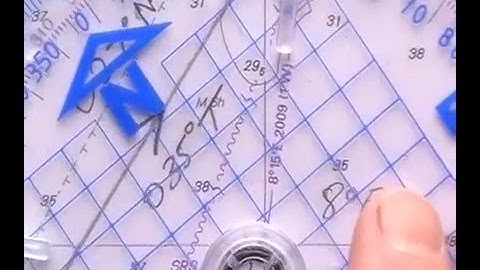 Using a navigational protractor to lay off a bearing