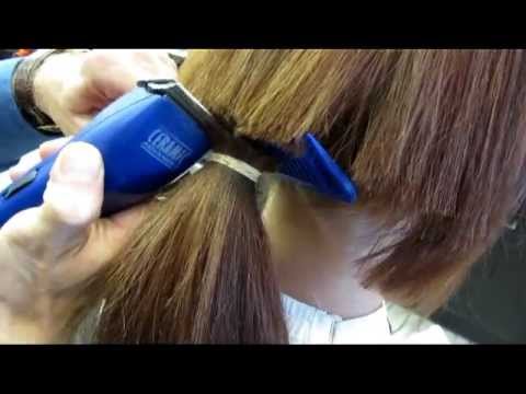 cutting women's long hair with clippers