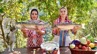 Trout Fish Stuffed with Walnuts and Pomegranate and Cooked Outdoor in Village