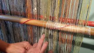 knitting a heddle on  warp weighted loom