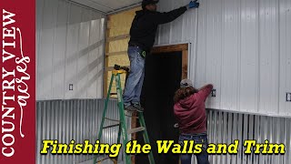Finishing the Walls and Trim in the dog kennel, and installing insulation the Ceiling.