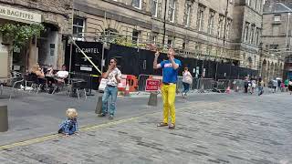 Witch hears the Gospel outside Edinburgh Cathedral