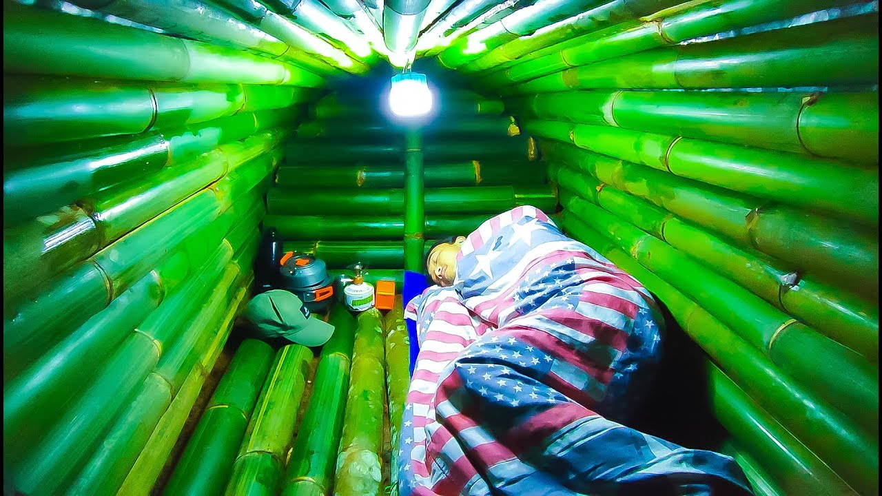 Build a warm shelter , solo camping in heavy rain , survival bushcraft ...
