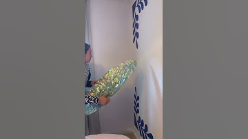 Hanging my disco leaf with command strips #diy #discoball #discoleaf