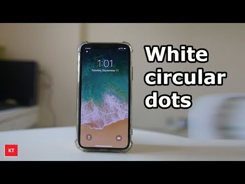 White Circular Dots On The Upper Left Corner Of The Iphone